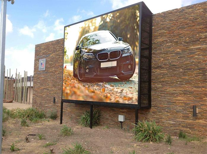 High impact commercial outdoor advertising billboard fixed installation on building facade
