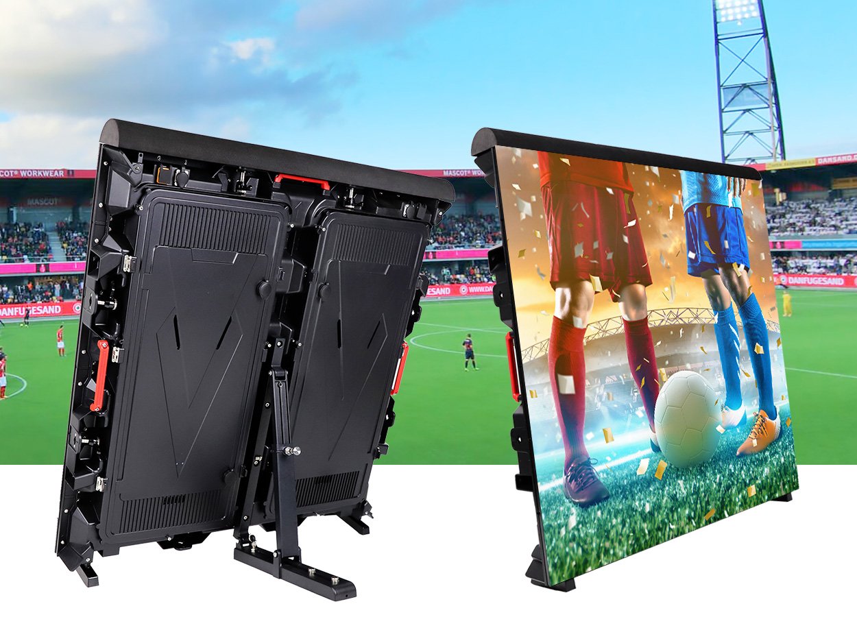 Wide-angle view of an outdoor football stadium with perimeter LED display boards installed around the entire field during a match.